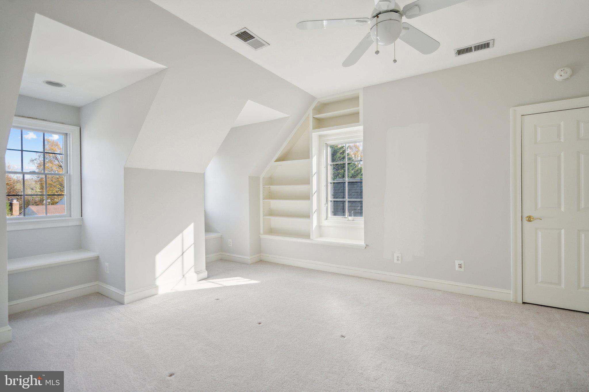 8802 Northern Spruce Lane Alexandria, VA 22309 - Photo 28 of 41 wooden floor in an empty room with a window