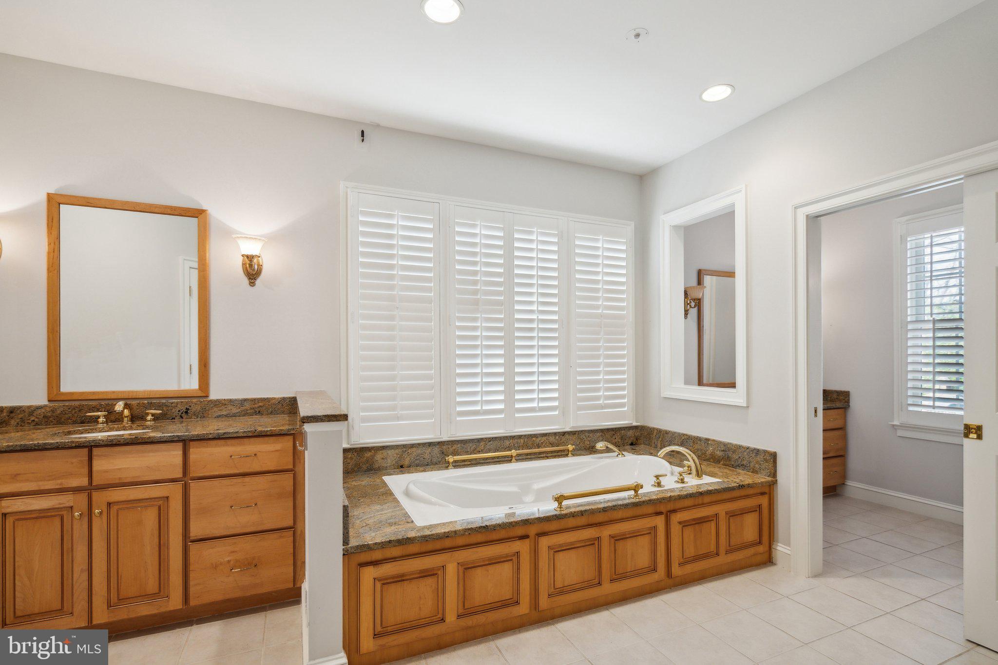 8802 Northern Spruce Lane Alexandria, VA 22309 - Photo 35 of 41 a kitchen with a stove and a cabinet