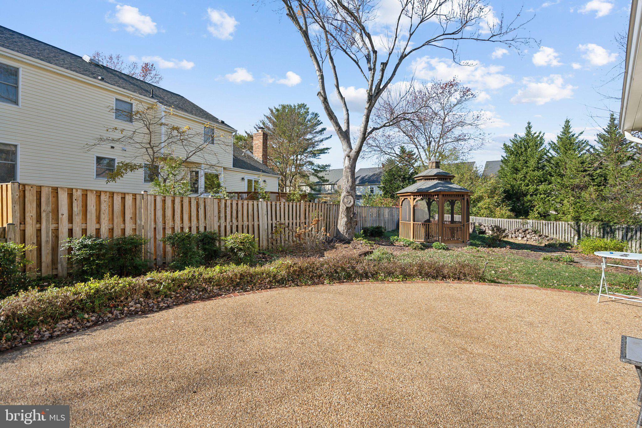 8802 Northern Spruce Lane Alexandria, VA 22309 - Photo 40 of 41 a view of a house with a yard