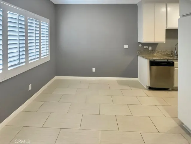 a view of a kitchen with a sink