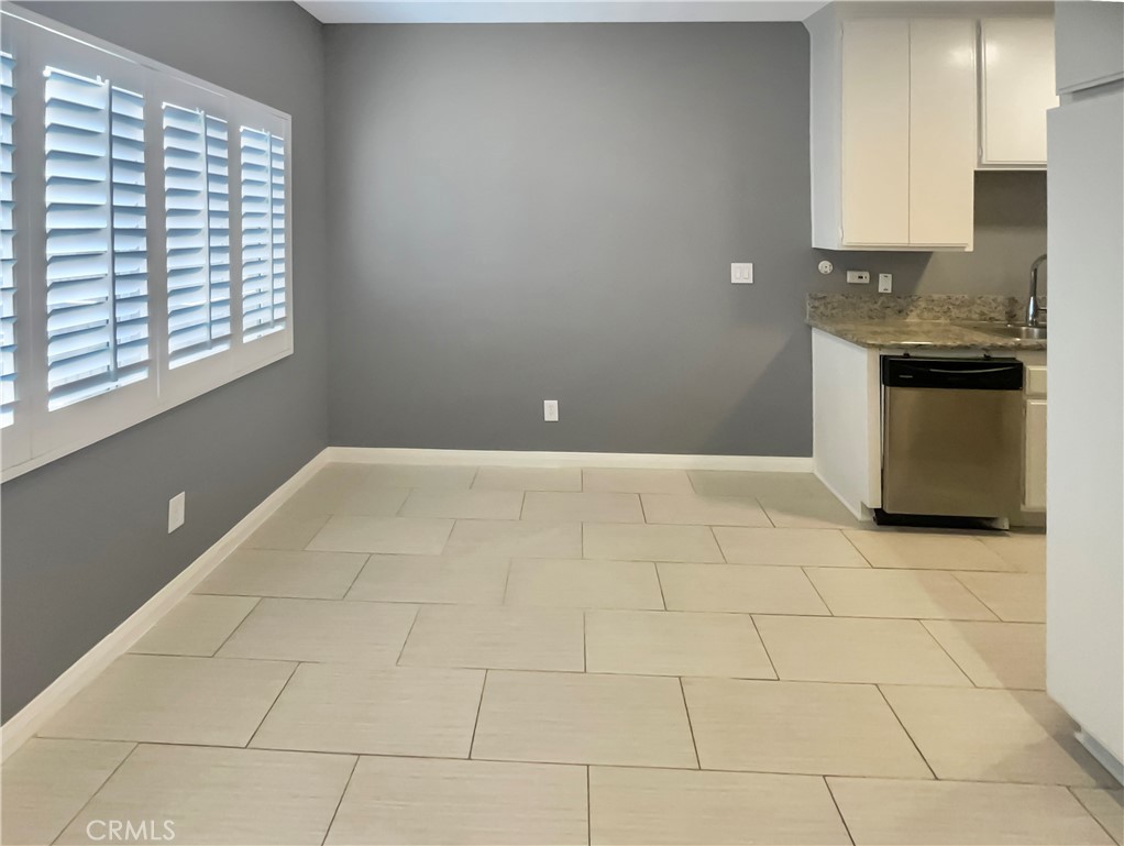 14560 Clark Street, Unit 202 Sherman Oaks, CA 91411 - Photo 5 of 18 a view of a kitchen with a sink