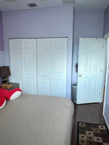 a bedroom with a bed