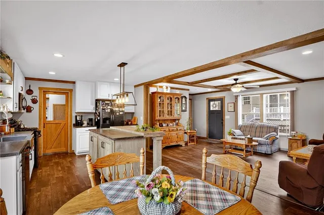 a bathroom with a sink a mirror and a shower
