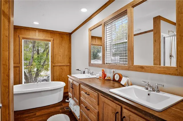 a white toilet sitting next to a bathroom sink