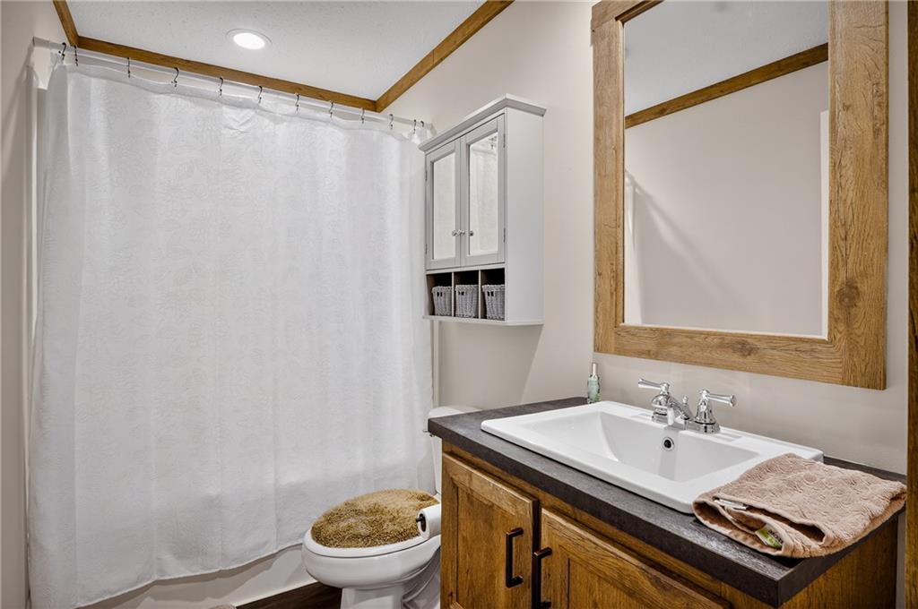 426 Perry Circle Cranberry Township, PA 16066 - Photo 27 of 35 a bathroom with a sink toilet and shower