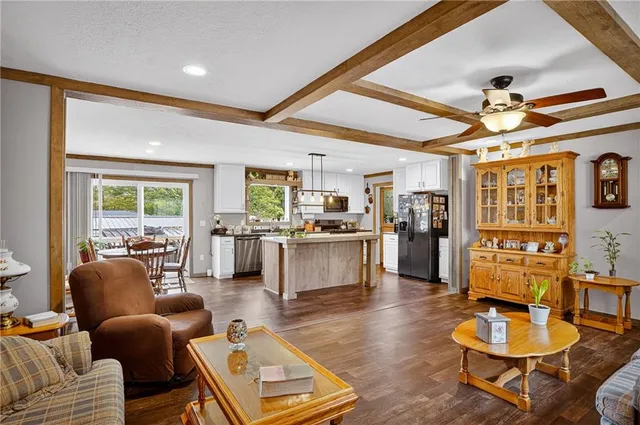 a view of a backyard with large trees