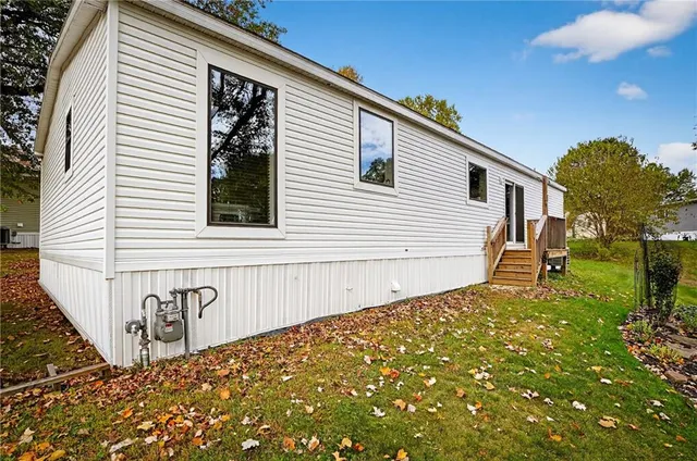 an aerial view of city and lake