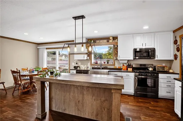 a view of a living room and dining room