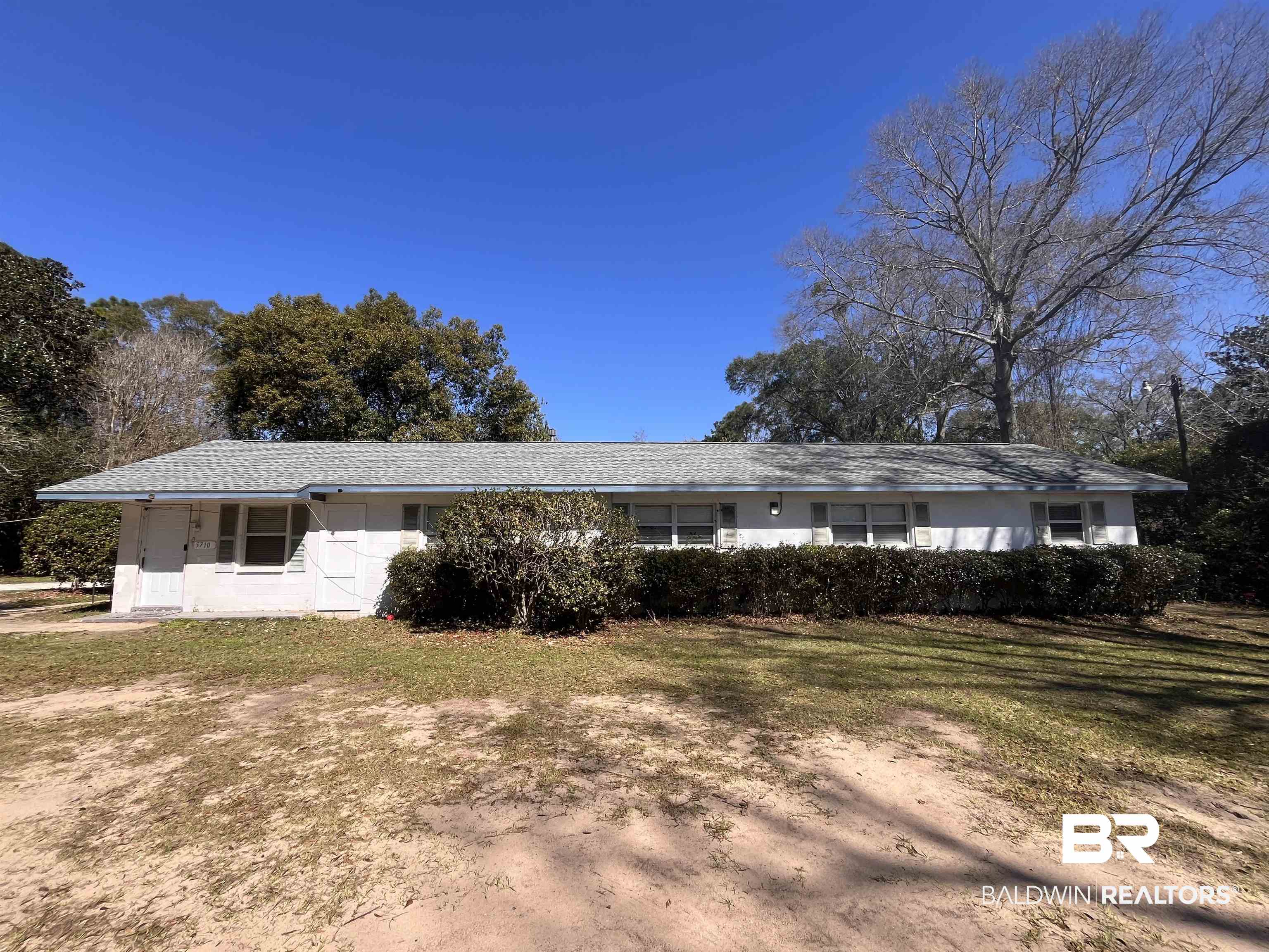 5710 Antoine Road Mobile, AL 36693 - Photo 1 of 7 Ranch-style home with a front lawn