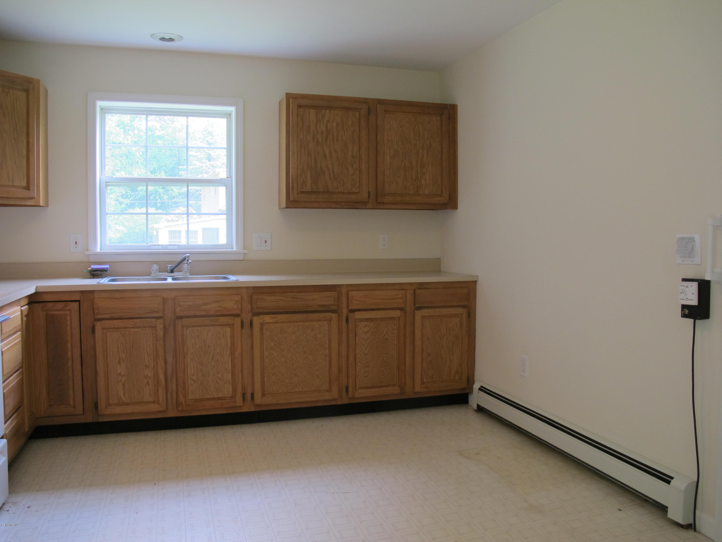 54 Salisbury Road Sheffield, MA 01257 - Photo 11 of 27 a room with cabinets