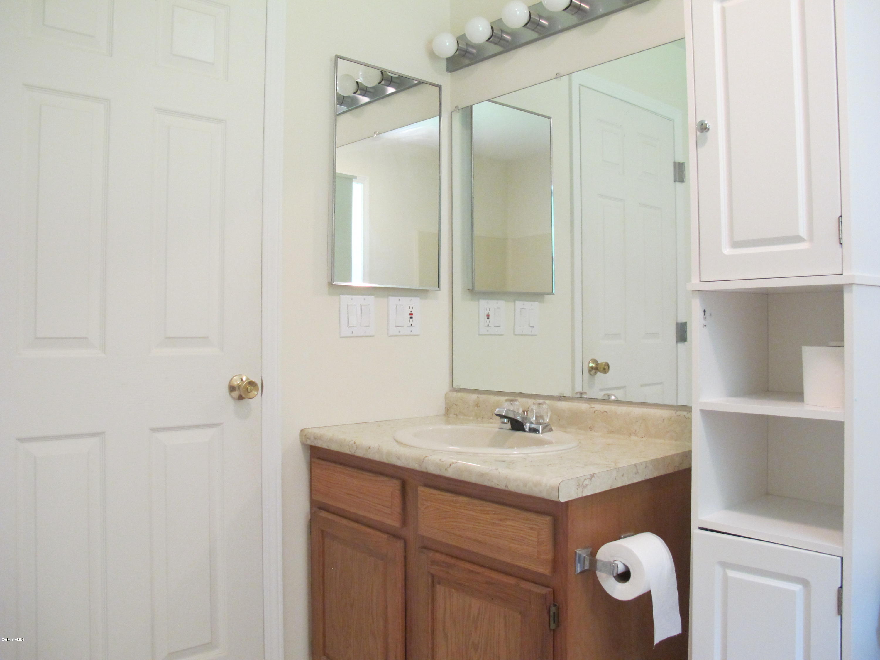 54 Salisbury Road Sheffield, MA 01257 - Photo 15 of 27 a bathroom with a sink and mirror