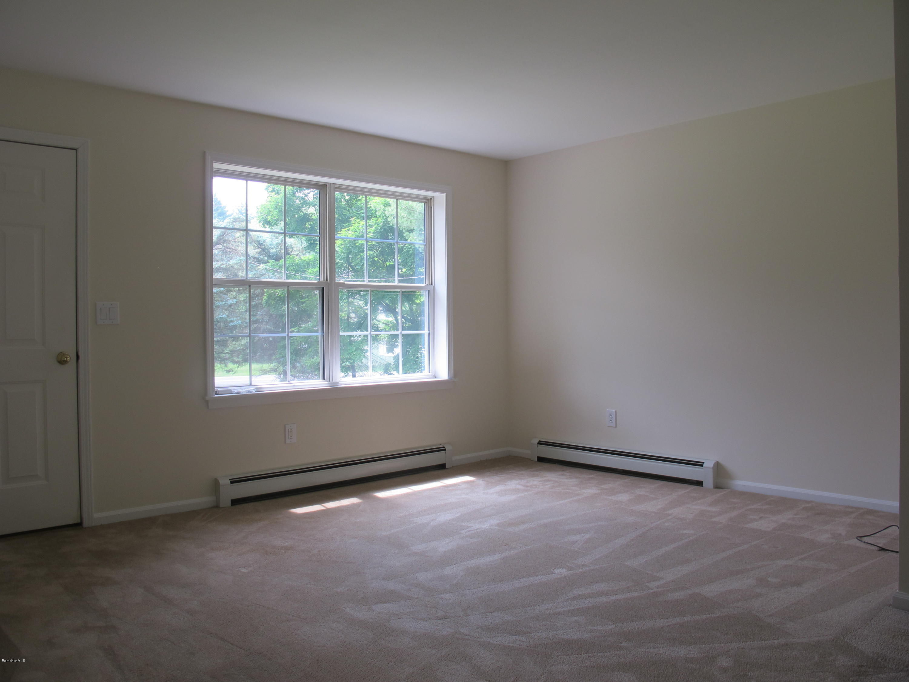 54 Salisbury Road Sheffield, MA 01257 - Photo 3 of 27 an empty room with a window