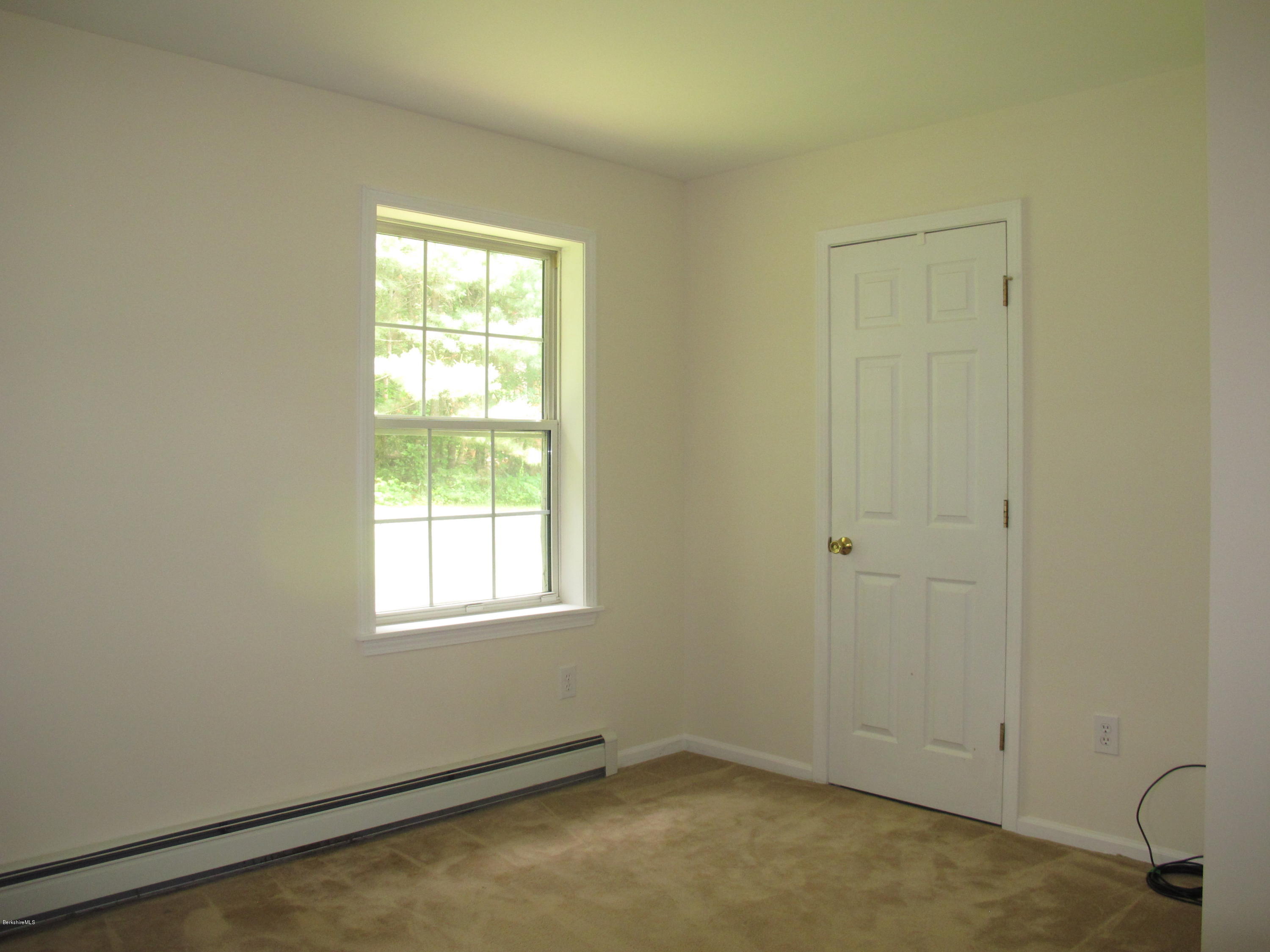 54 Salisbury Road Sheffield, MA 01257 - Photo 21 of 27 an empty room with a window