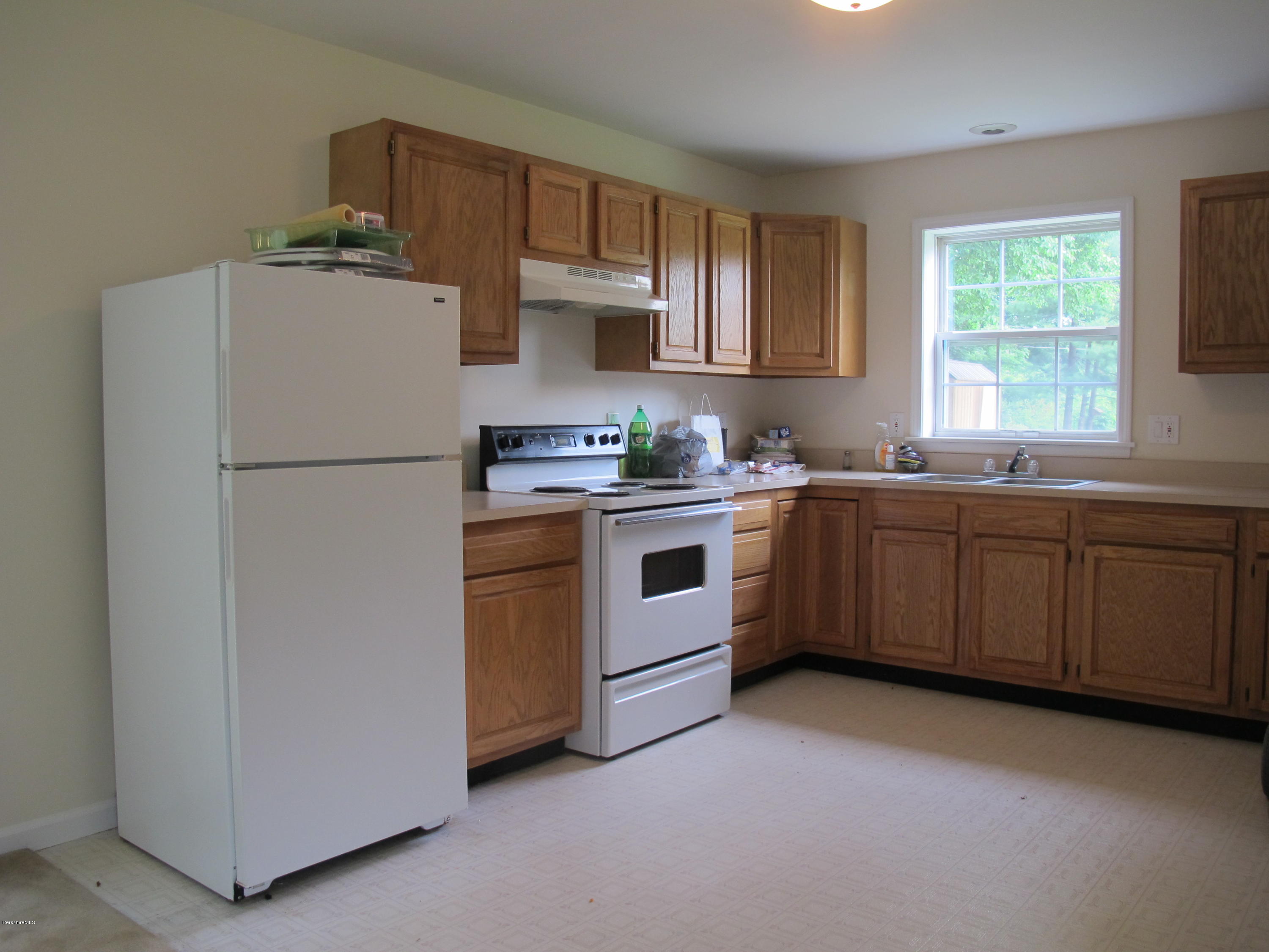 54 Salisbury Road Sheffield, MA 01257 - Photo 8 of 27 a utility room with cabinets washer and dryer