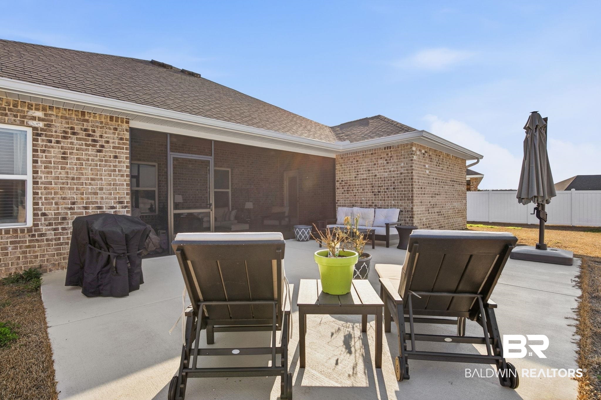 11123 Genuine Risk Circle Daphne, AL 36526 - Photo 51 of 67 View of patio / terrace featuring an outdoor lounge area, a grill, and a sunroom