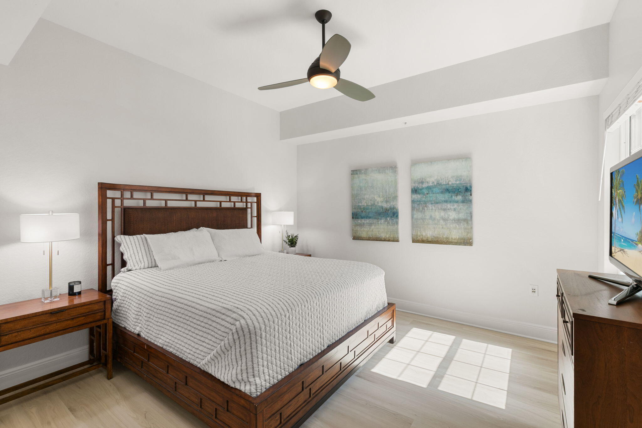9213 Museo Circle, Unit 103 Naples, FL 34114 - Photo 21 of 47 a bedroom with a bed lamp and window