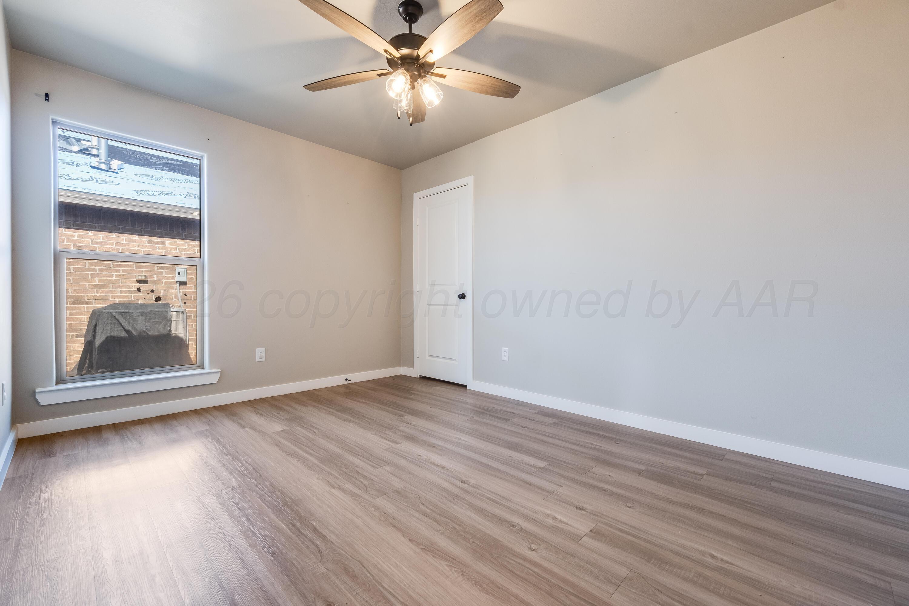 1639 Montaluse Road Amarillo, TX 79118 - Photo 21 of 31 Bedroom 3 - 1