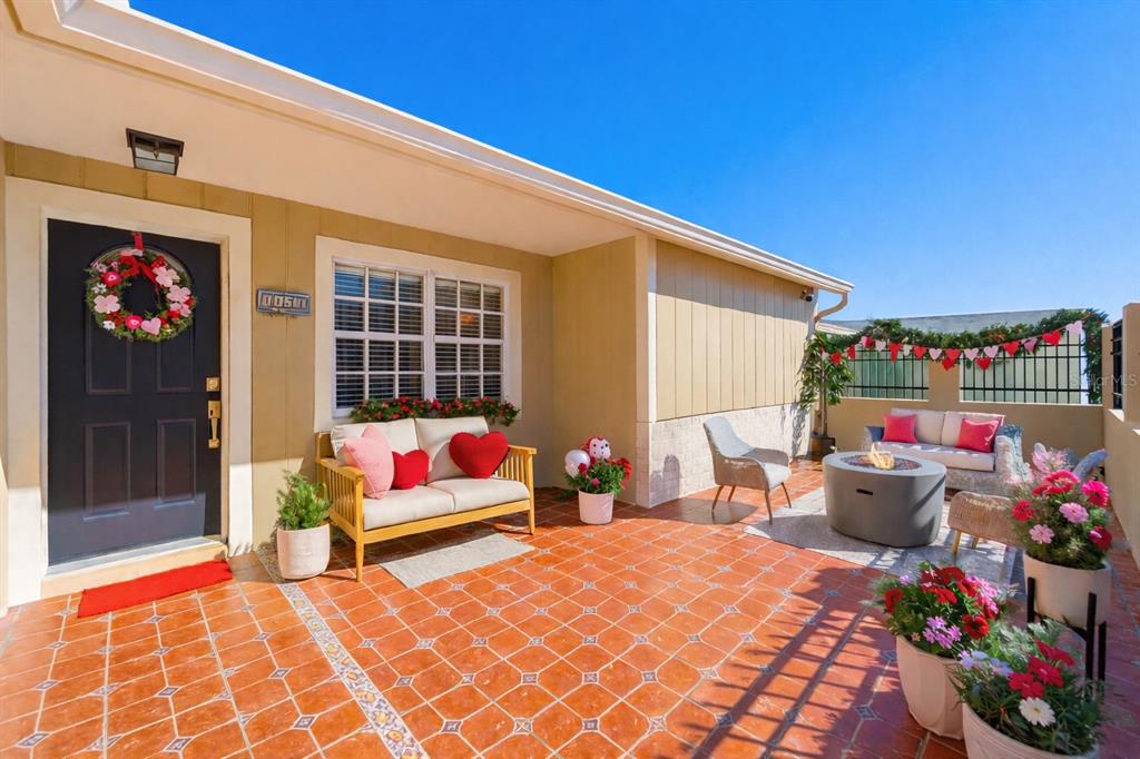 a backyard of a house with seating space
