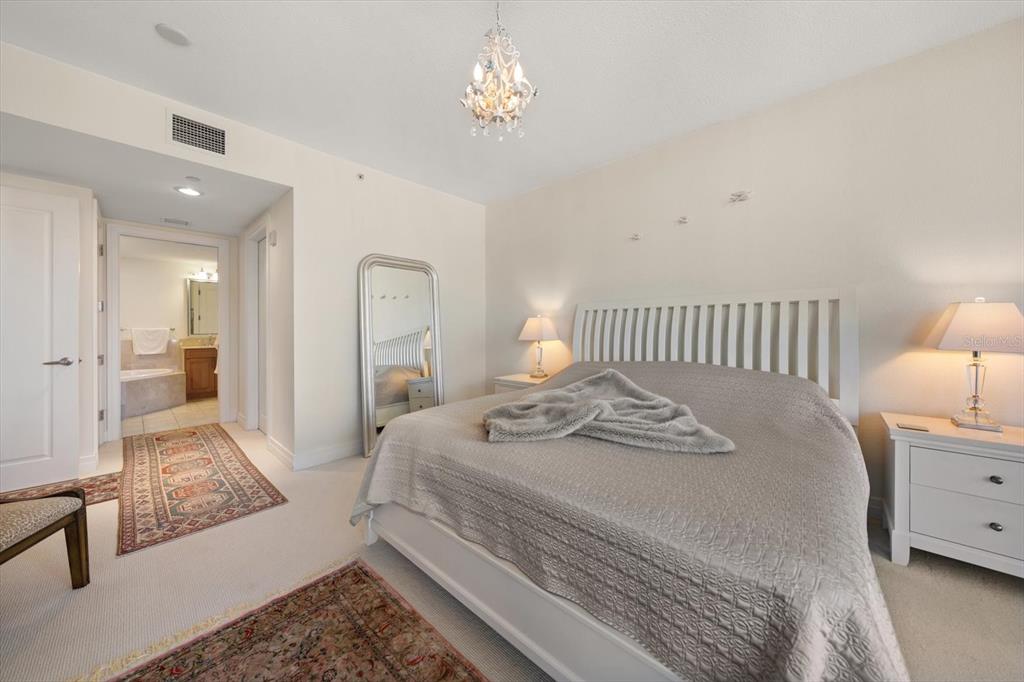 331 Cleveland Street, Unit 301 Clearwater, FL 33755 - Photo 18 of 39 a bedroom with bed and window