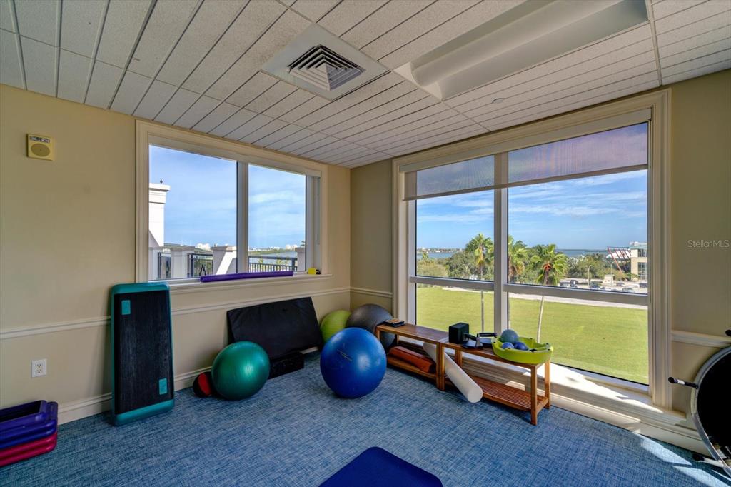 331 Cleveland Street, Unit 301 Clearwater, FL 33755 - Photo 35 of 39 a room with furniture and a large window