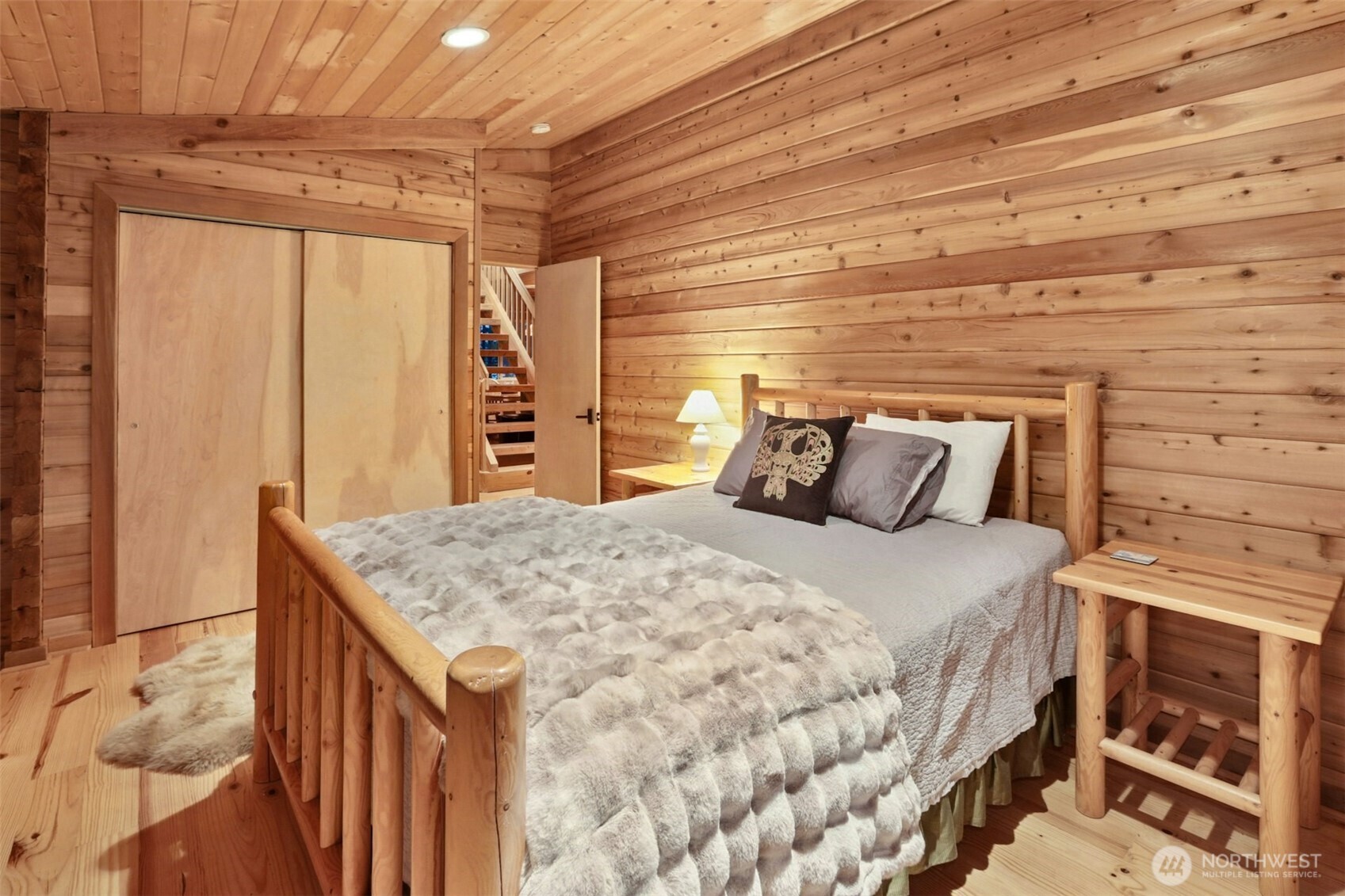 5 Smugglers Cove Road Friday Harbor, WA 98250 - Photo 14 of 36 a bedroom with a bed and a dresser