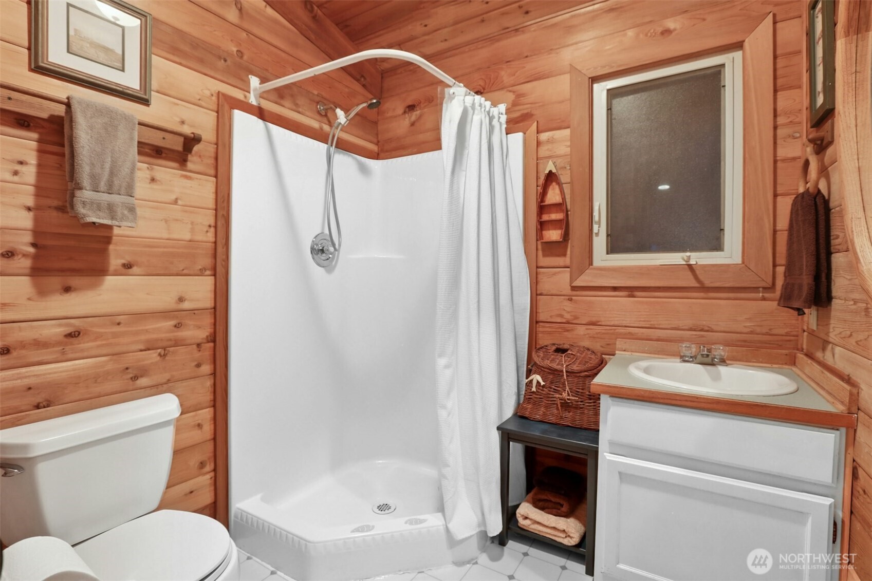 5 Smugglers Cove Road Friday Harbor, WA 98250 - Photo 18 of 36 a bathroom with a sink toilet and shower