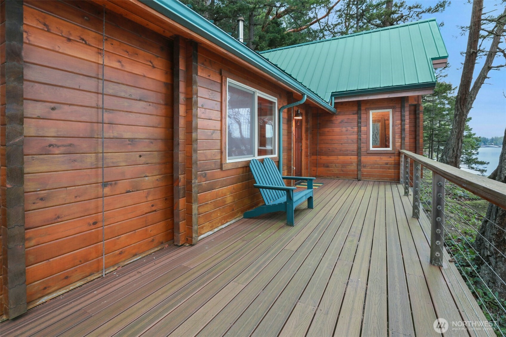 5 Smugglers Cove Road Friday Harbor, WA 98250 - Photo 19 of 36 a porch with seating space