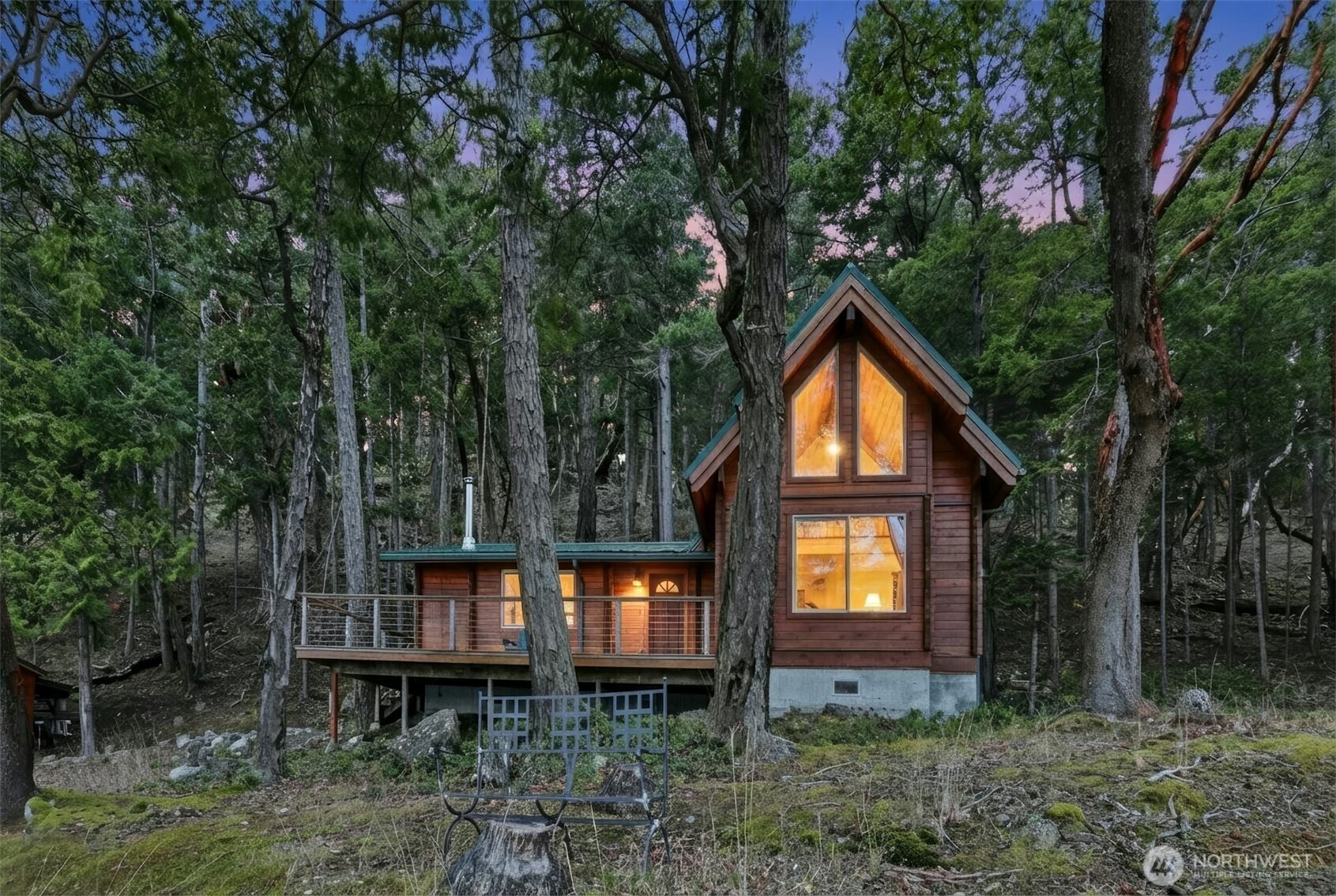 5 Smugglers Cove Road Friday Harbor, WA 98250 - Photo 26 of 36 a backyard of a house with lots of green space