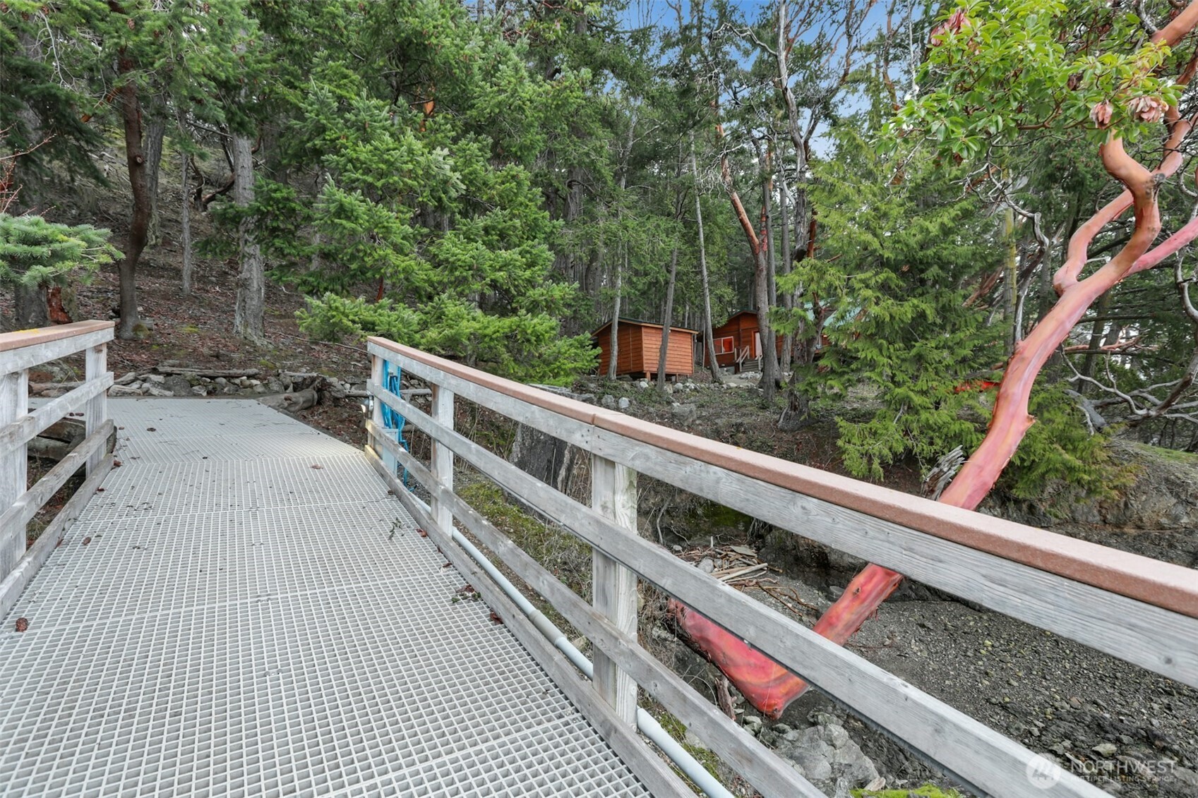 5 Smugglers Cove Road Friday Harbor, WA 98250 - Photo 28 of 36 a view of balcony with wooden floor and fence