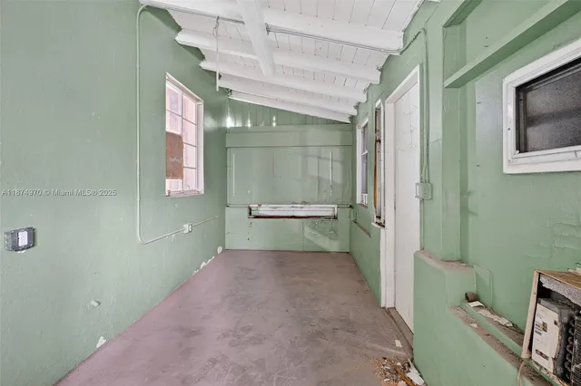 a bathroom with a sink and mirror