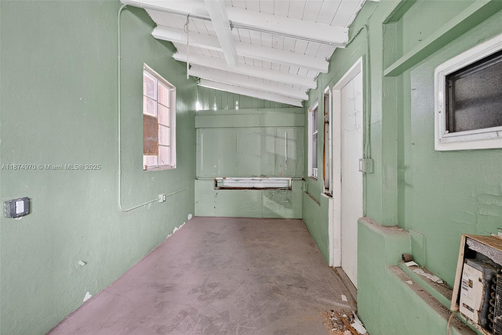 2850 Northwest 4th Street Miami, FL 33125 - Photo 13 of 17 a bathroom with a sink and mirror