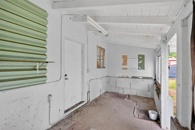 a bathroom with a tub and shower