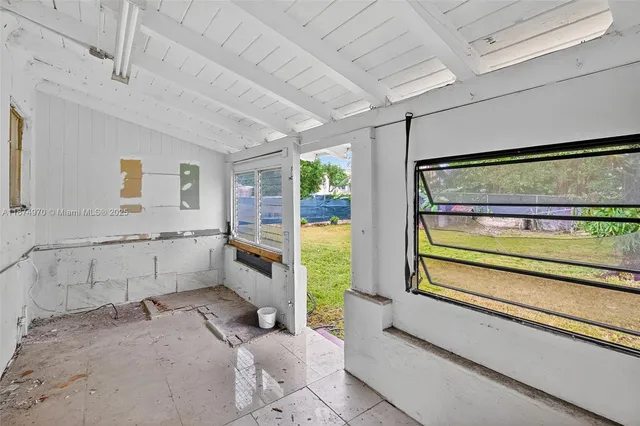 a bathroom with a sink and a large mirror