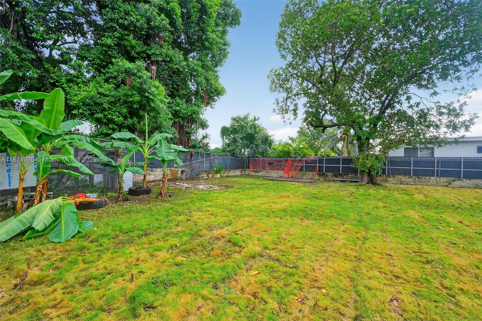 2850 Northwest 4th Street Miami, FL 33125 - Photo 16 of 17 a view of yard with green space and trampoline