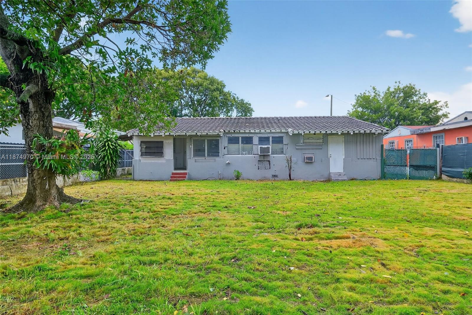 2850 Northwest 4th Street Miami, FL 33125 - Photo 17 of 17 a view of a house with a backyard