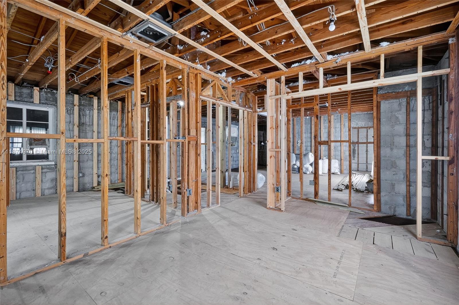 2850 Northwest 4th Street Miami, FL 33125 - Photo 5 of 17 a view of an empty room with wooden frame