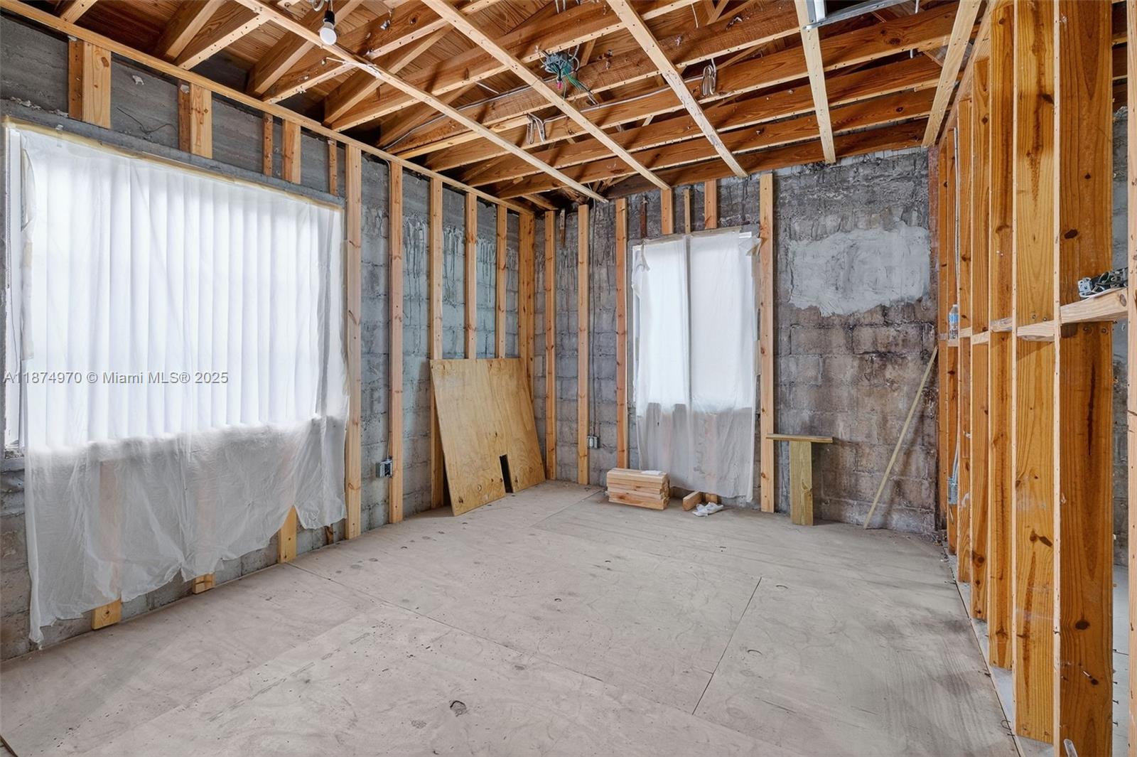2850 Northwest 4th Street Miami, FL 33125 - Photo 8 of 17 a view of an empty room with a balcony