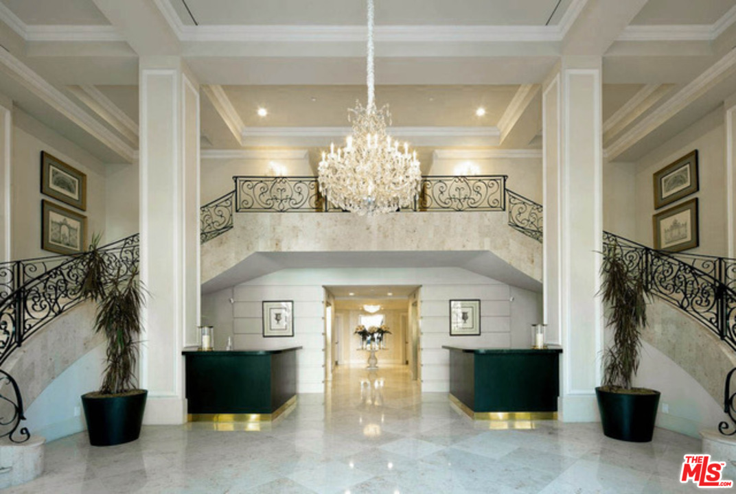 425 North Maple Drive, Unit 304 Beverly Hills, CA 90210 - Photo 2 of 26 a view of a chandelier in a livingroom