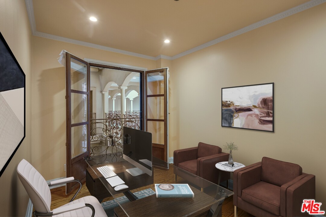 425 North Maple Drive, Unit 304 Beverly Hills, CA 90210 - Photo 21 of 26 a living room with furniture and a floor to ceiling window