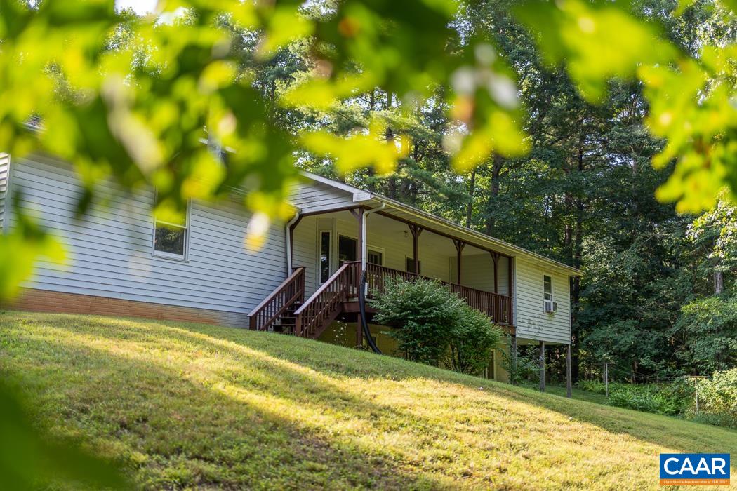 113 Plum Tree Draft Road Churchville, VA 24421 - Photo 1 of 43 a house view with a backyard space