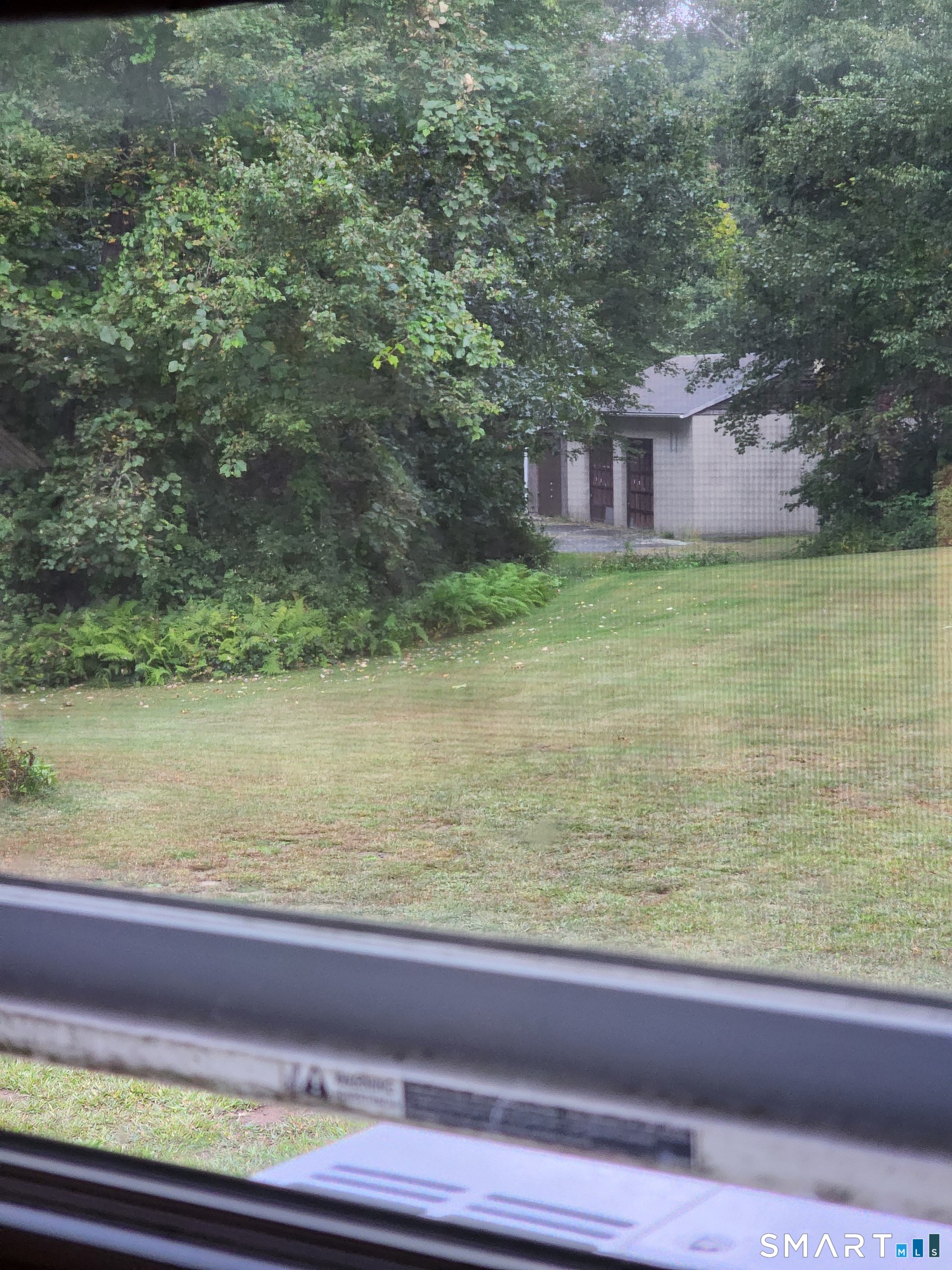 312 Gehring Road Tolland, CT 06084 - Photo 4 of 30 a wooden floor with a lake view