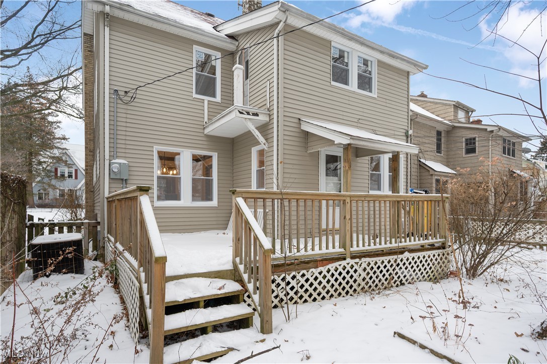 2016 Rossmoor Road Cleveland Heights, OH 44118 - Photo 44 of 46 Snow covered back of property featuring a wooden deck