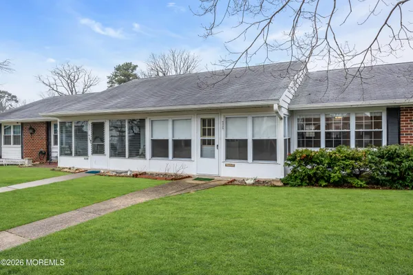 a house view with a garden space