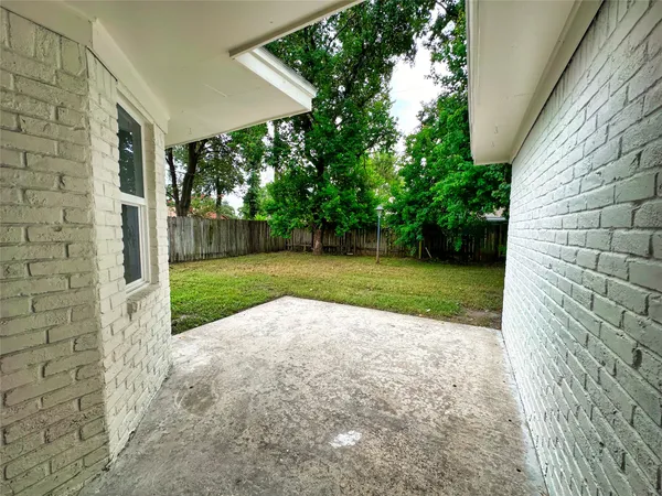 a view of a backyard with a garden
