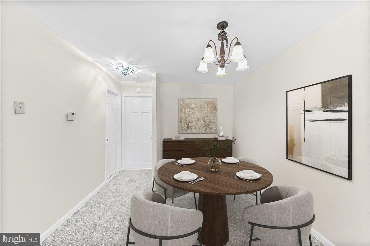 4701 Pennell Road, Unit D8 Aston, PA 19014 - Photo 10 of 25 Digitally Staged Dining Room