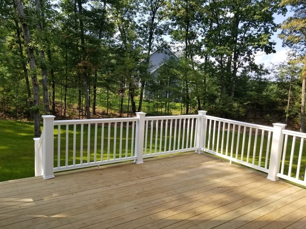 108 Robin Hill Road Groton, MA 01450 - Photo 19 of 24 a view of a wooden deck