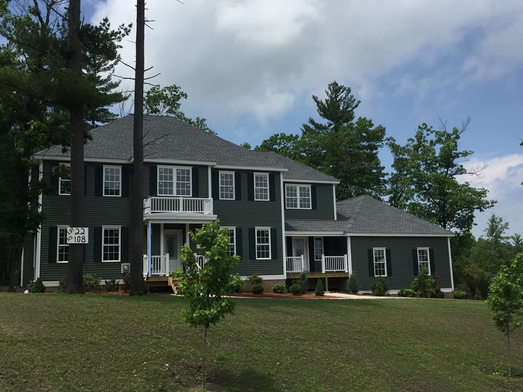 108 Robin Hill Road Groton, MA 01450 - Photo 23 of 24 front view of a house with a yard