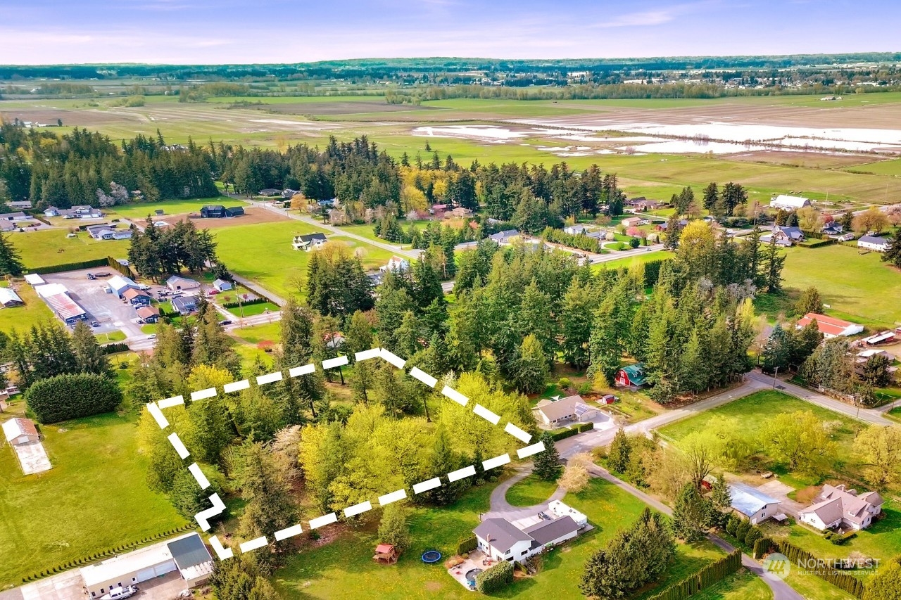 933 Van Dyk Road Lynden, WA 98264 - Photo 1 of 10 a view of a lake with a city
