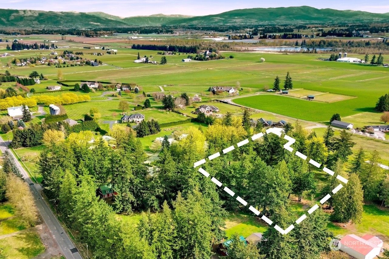 933 Van Dyk Road Lynden, WA 98264 - Photo 3 of 10 a view of a city with lots of trees and houses in the background