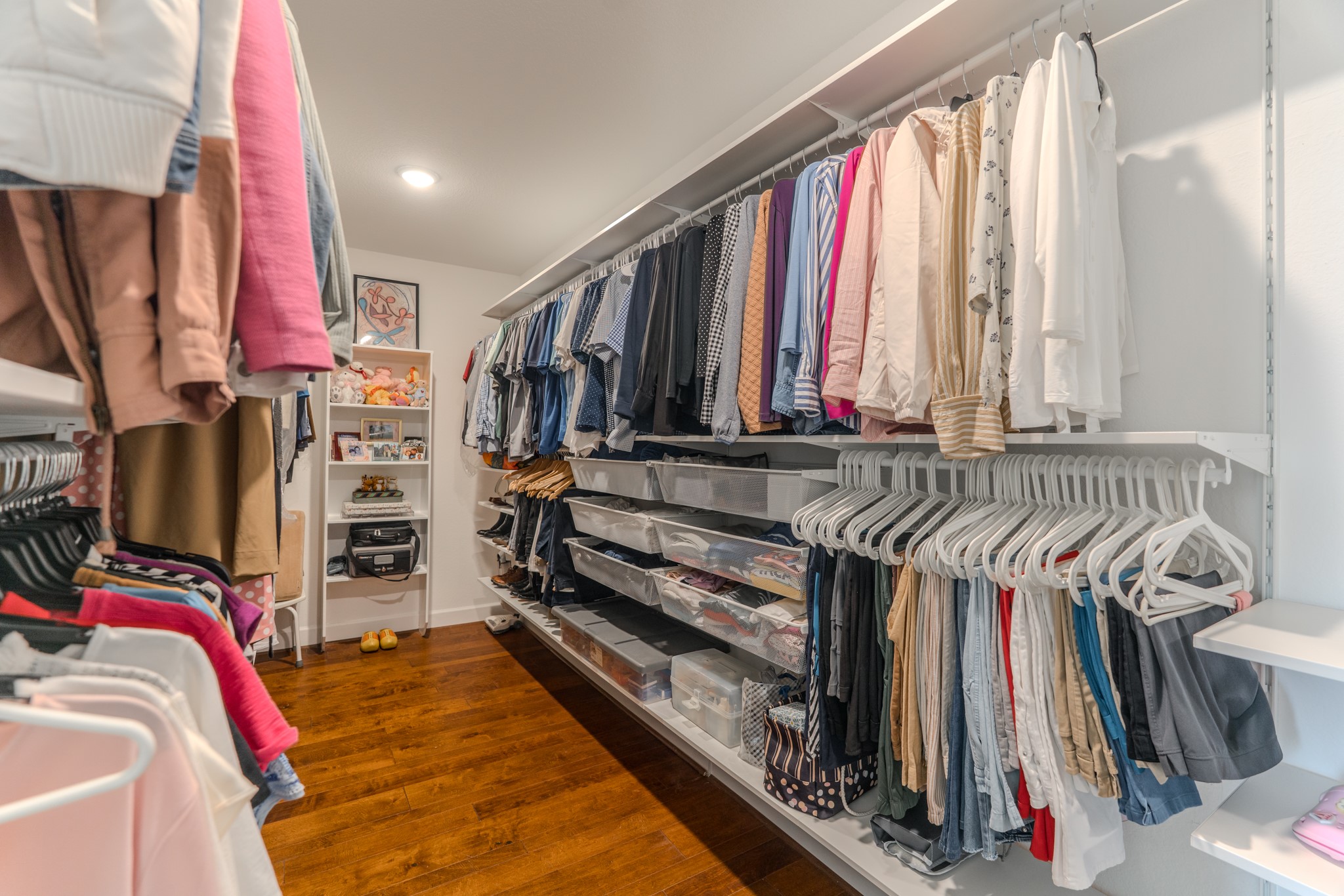 24322 North Newcastle Bay Trail Spring, TX 77389 - Photo 31 of 50 a view of walk in closet with clothes and shoes